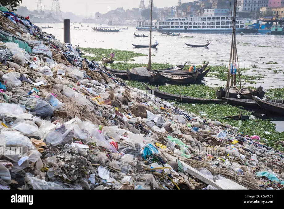 garbage and plastic pollution on the river bank in Dhaka, Bangladesh ...
