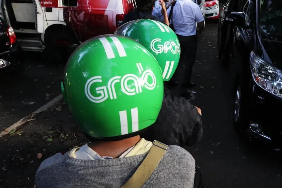 Kekuasaan, Protes, dan Skala Platform: Mengapa Indonesia Mendorong Merger Grab dan GoTo